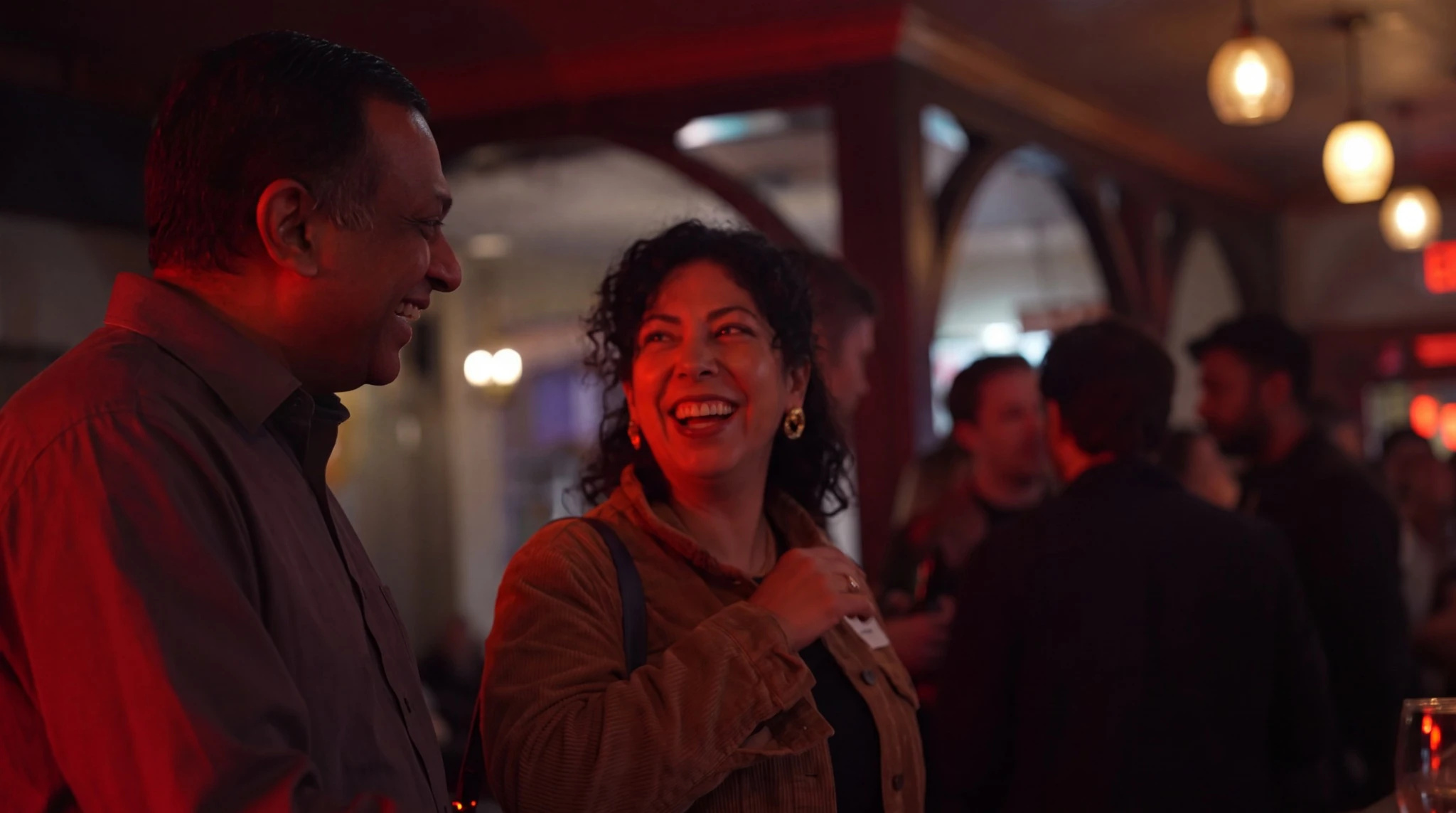 Guests enjoying a conversation at a Brvsh Cul7ur3 social event